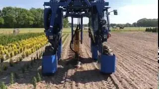 High clearance tractor with drill unit
