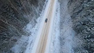 Follow the car on the snow road
