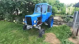 T-25 or mini MTZ-80. I'm going to look at the tractor.