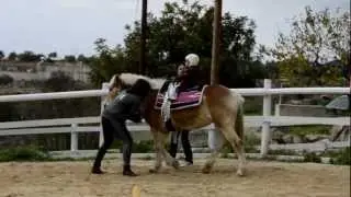Naomi Papacosta on her first riding lesson at Eagle Mountain Ranch
