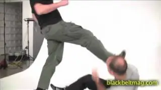 Eyal Yanilov Krav Maga Global | Defending a kick to the face while seated