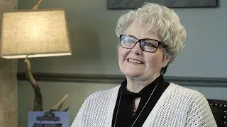Phyllis H. on her implant supported denture