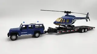 Diecast: Gendarmerie Land Rover Defender 110 Helicopter Transport • 1:47 Scale