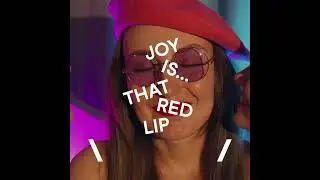 Joy is that red lip.
