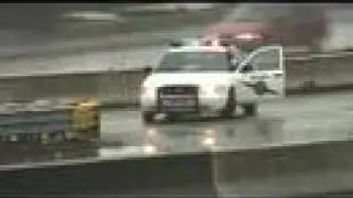 News Footage: Car Fatally Drops 30ft into Swamp
