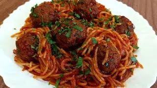 Spaghetti with meatballs in tomato sauce
