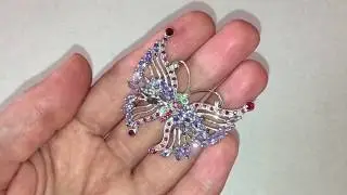 Серебряная брошь Бабочка с танзанитами