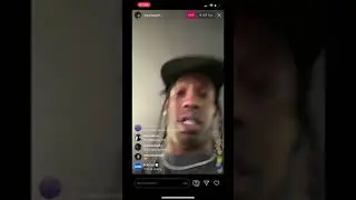 Travis scot playing Fortnite and watching his own live event