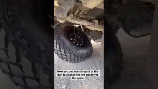 Custom spare tire carrier on the flatbed
