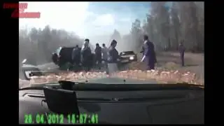 Car Crashes into Group