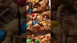 This is your sign to make leftover Halloween candy cookie bars