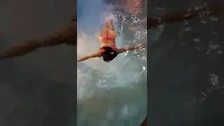 Sexy Colombian Girl Swimming in the swimming pool in bikini