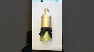 Botella reciclada y decorada