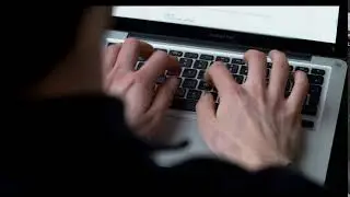 Stock Footage of man Typing on Laptop 4K
