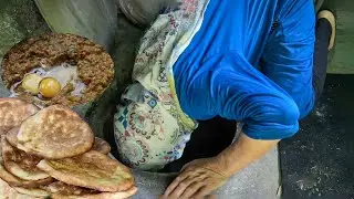 Cooking one of the most original dishes of northern Iran (Mirza ghassemi) with tandoori bread.