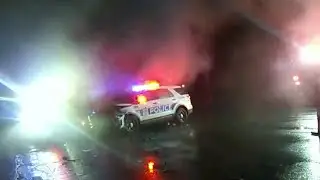 Driver Crashes through Police Road Block