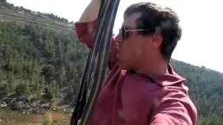 Down the mountain zip-line! between two hills in the Deer-land farm next to Jerusalem.