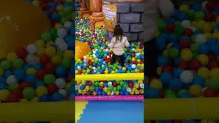 Karina plays with balls