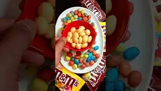 Oddly satisfying thousands of m&m's #shorts