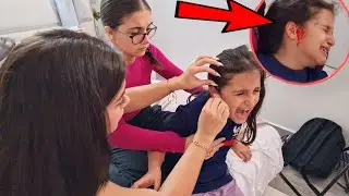 SHE WANTS TO CUT HER HAIR (She cuts her ear)