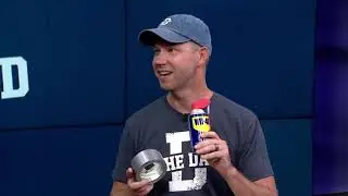 Editor in Chief of The Dad Joel Willis gives Channel 12 Anchor Adam Clements a New Dad Starter Kit