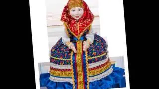 Симпатичная кукла грелка на чайник ручной работы
