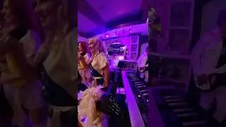 Abba cover band with a keytar on a stand 🎹