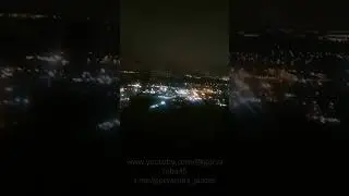 Ночной Санкт-Петербург из окна иллюминатора при взлете