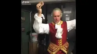 Jonathan Groff dances with a doughnut