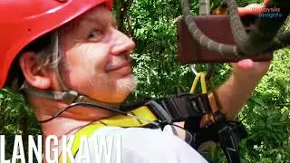 Langkawi, Malaysia: ziplining through towering trees in the rainforest canopy