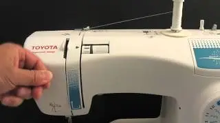 Enfilage supérieur avec une machine a coudre Toyota séries SP10-SP20