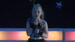 Audrey sings US National anthem at the opening ceremony of Westland Figure Skating show