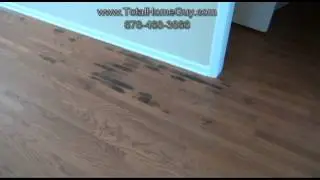 Atlanta Home Inspector finds a leak below the wood floor in the slab