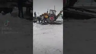 Загрузка трактора Юмз