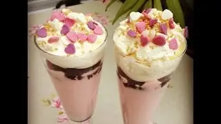 Strawberries mousse with chocolate and whipped cream flutes