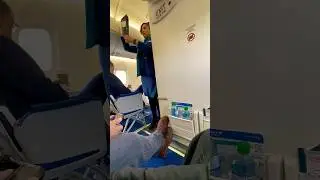 WestJet Flight Attendant Performing Safety Performance