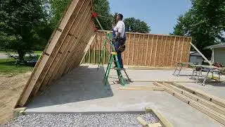 Framing and lifting a HEAVY Wall with only 2 Guys!