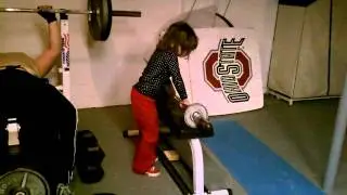 Madison lifting weights.