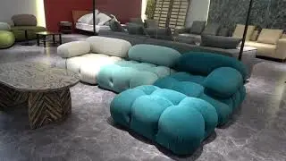 A modular blue sofa with gradual color change