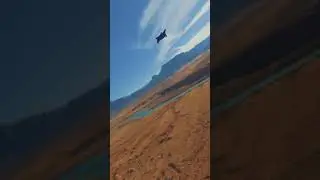 FPV Drone chasing a Wingsuit