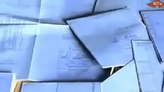 The Wife of Ato Gebrewahid Gebre Giorgis Caught Evacuating Documents from their Residential Low)