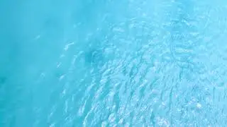 Beautiful ocean waves and water splash at the turquoise blue lagoon.