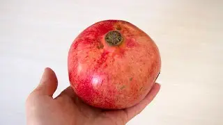They took a pomegranate and made a winter fruit bouquet. Bouquet of pomegranate.