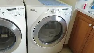 Remove lower front panel on Whirlpool Duet Gas dryer. Model WGD9600TW1
