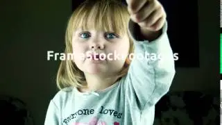 The little cute girl puts out the tongue in the camera