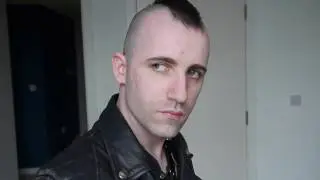 Heading out on the prowl - tight leather gear