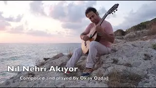 Nil Nehri Akıyor - Okay Özdağ