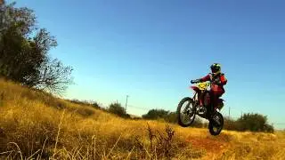 Slow motion jumps and power-slides on GasGas 250 EC