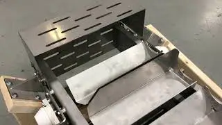 Horizontal Bucket Conveyor with 45° Product Rotation by Multi-Conveyor