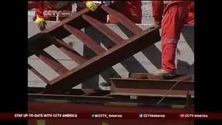 China's Migrant Workers' Salaries Up, but Challenges Remain